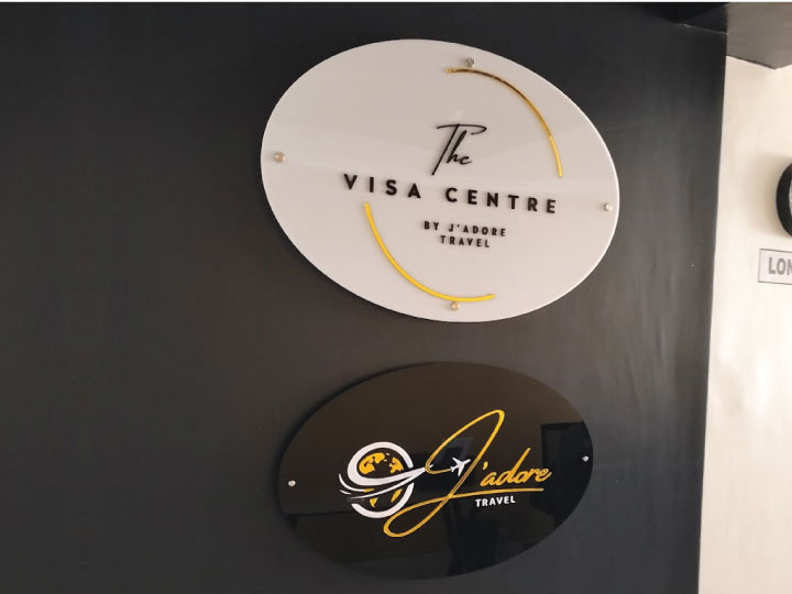 2D reception sign makers in Kenya installing custom office signage