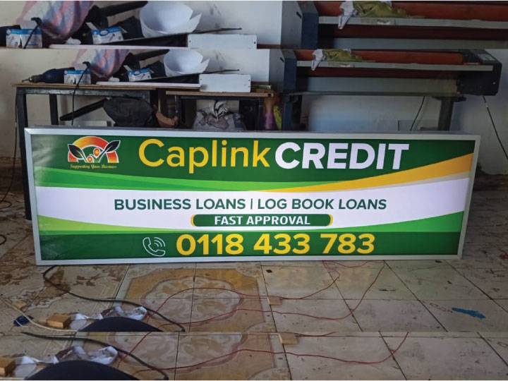 Acrylic face and translucent vinyl branding on LED lightbox sign in Nairobi Kenya