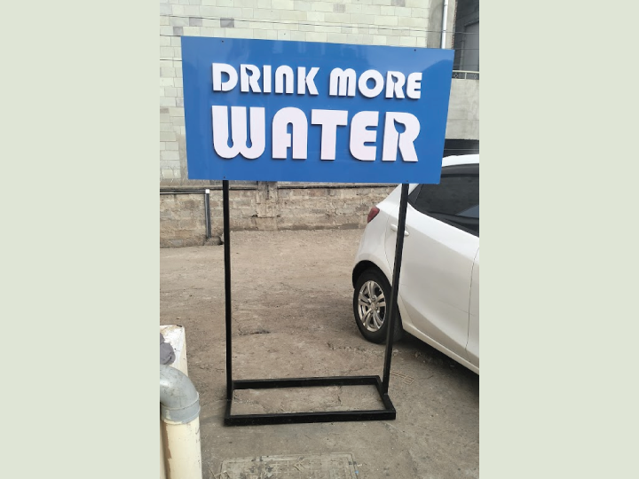 Directional sign board design layout with clear arrows and readable text in Nairobi Kenya