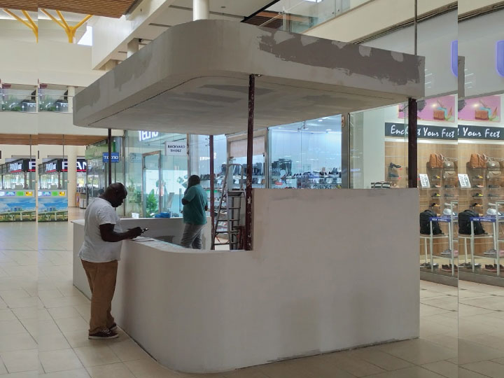 Food and beverage mall kiosk fabrication in Nairobi, Kenya with custom counter and display area.