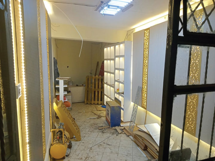 Office fit-out installation by professional contractors in Nairobi Kenya assembling partitions, counters and branded office elements.