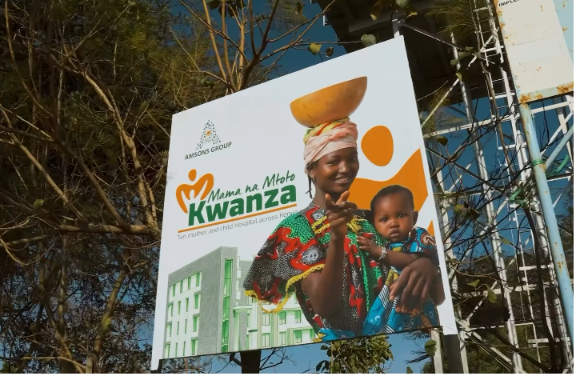 Mama na Mtoto billboard showing a mother and child beside a hospital illustration.